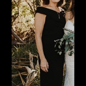 Black Calvin Klein evening dress. Worn once to my son’s wedding. Great fit!